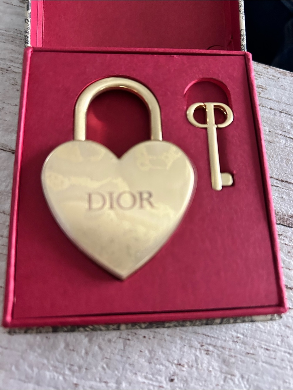 Dior Gold Heart Padlock and Key Set on Red Tray